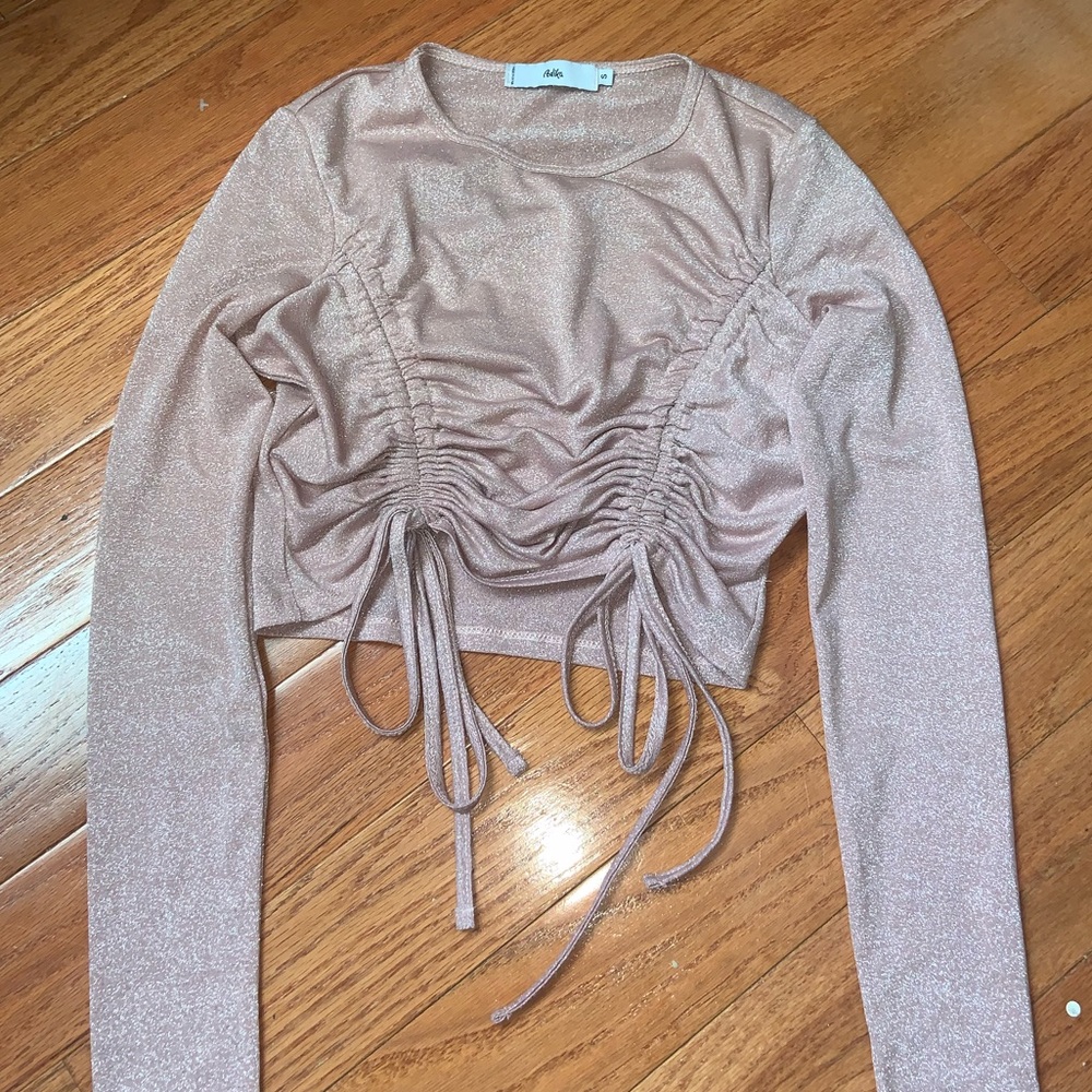 Glittery pink party top from Adika